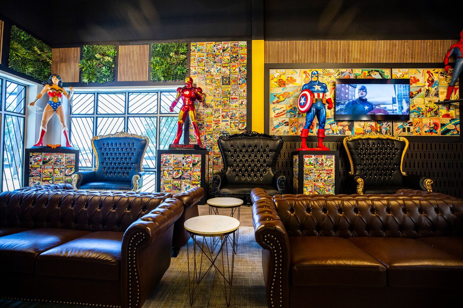Super Dentists in San Antonio A living room filled with furniture and statues of superhero characters.