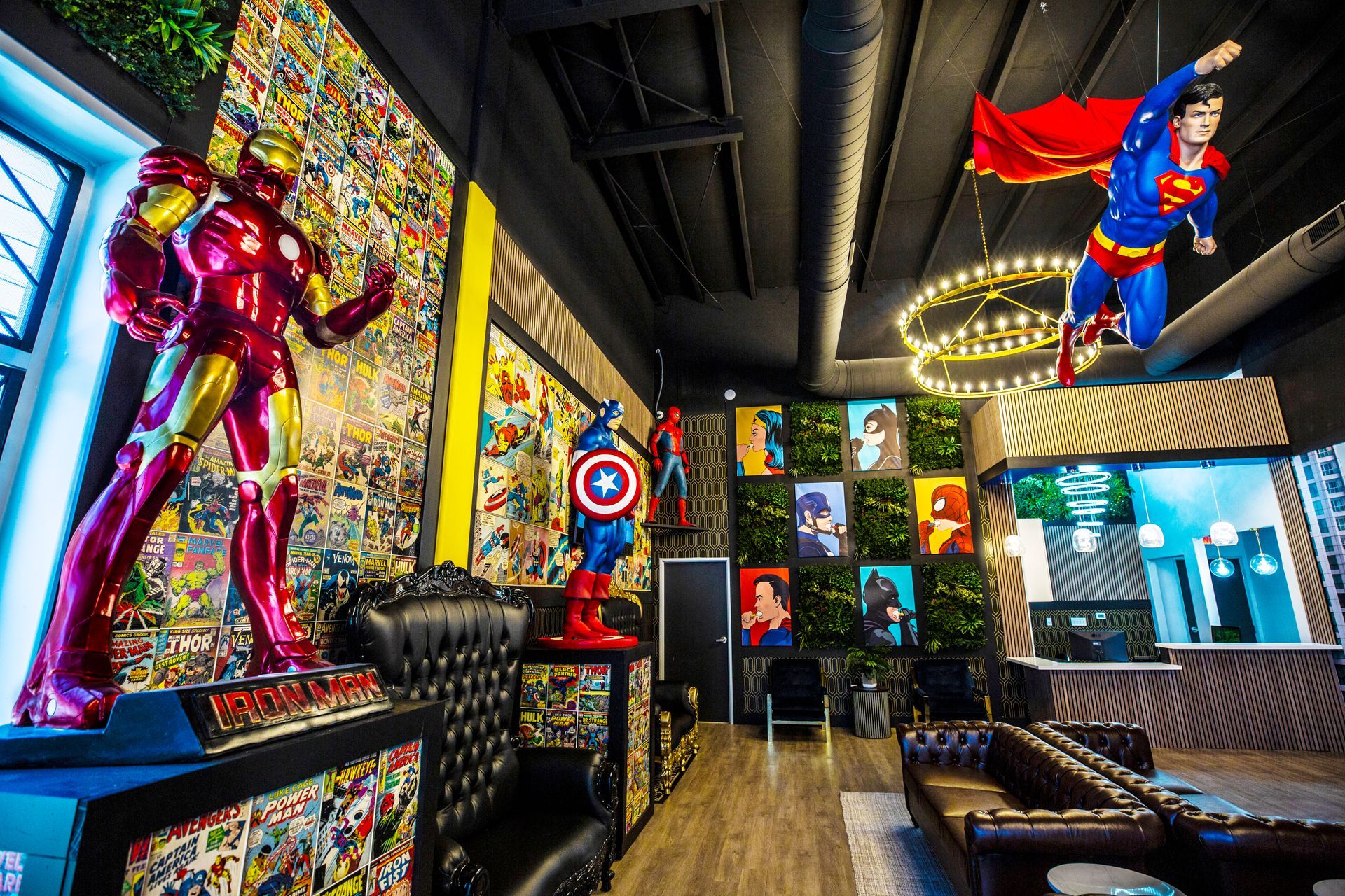 Super Dentists in San Antonio A room with a lot of superhero statues hanging from the ceiling.