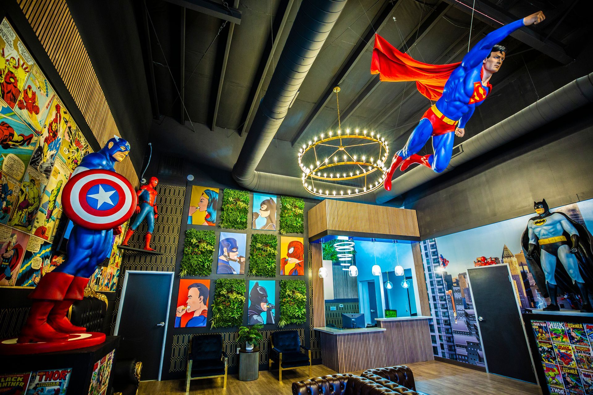 Super Dentists in San Antonio A room with a lot of superhero statues hanging from the ceiling.