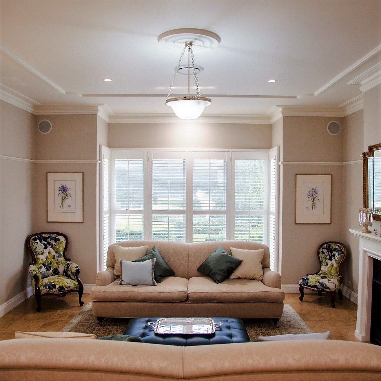 A living room with artwork installed and hung by ARTSHOP Toowoomba experts.