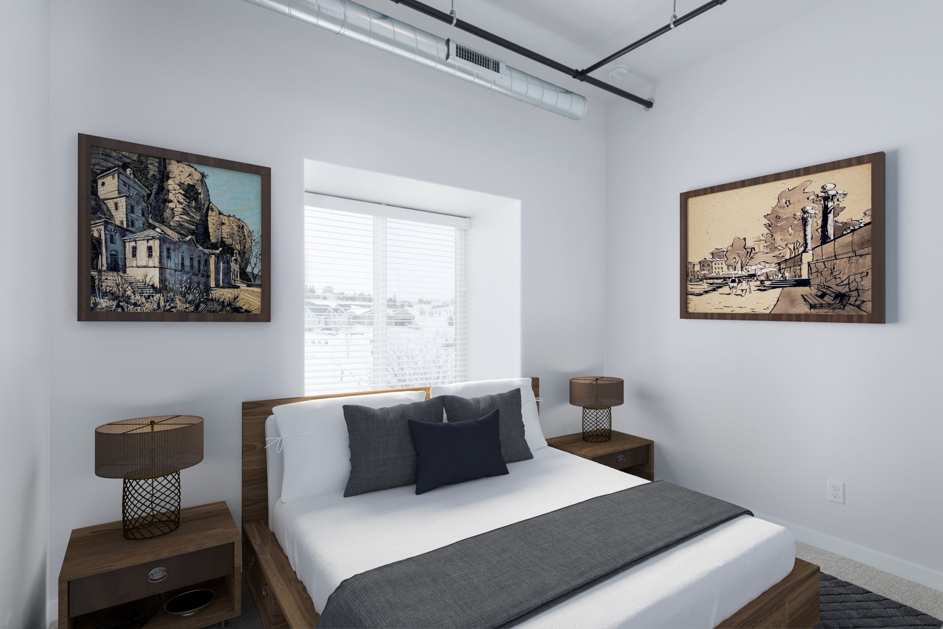 Modern bedroom with gray bed, two bedside tables, and framed wall art on white walls