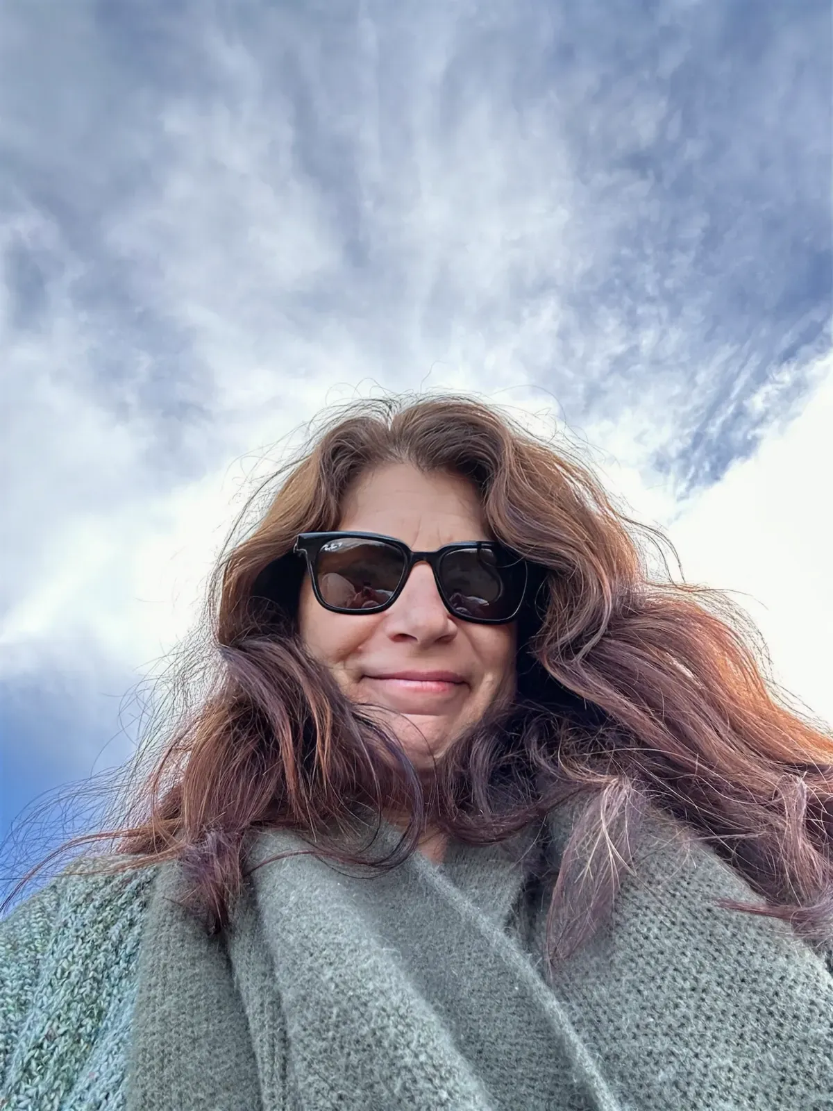 A selfie of Paula taken to show her face and the sky