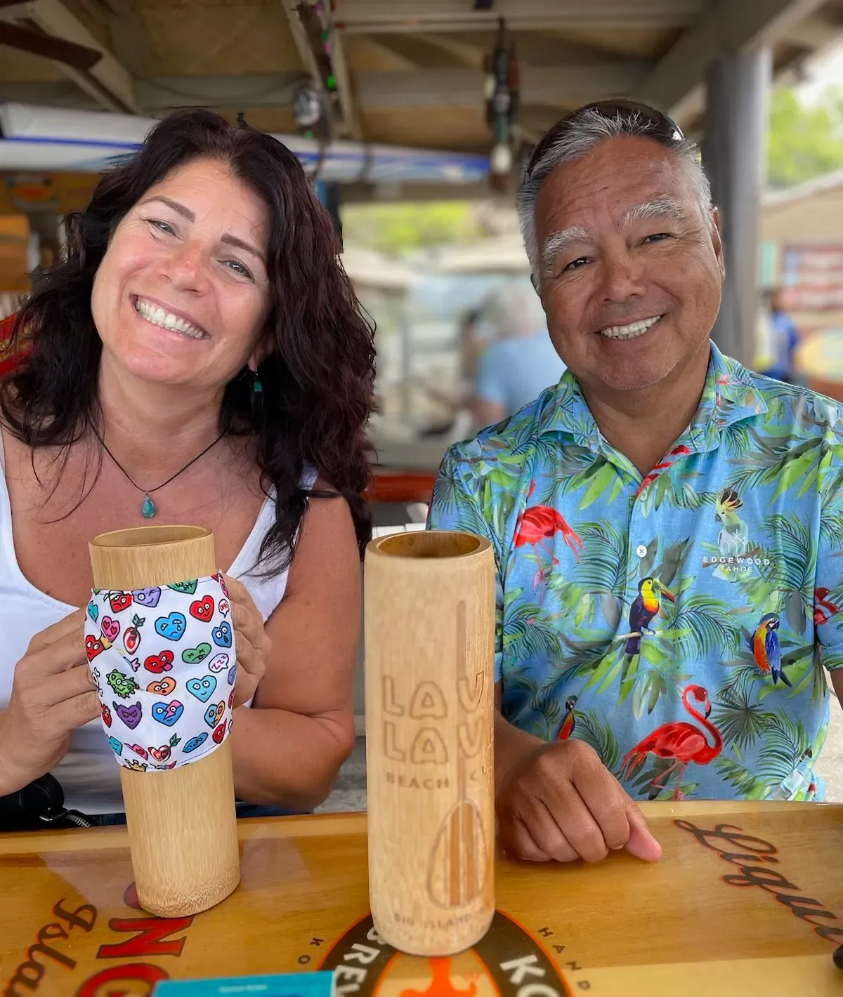 Paula and her friend at a bar in Kona