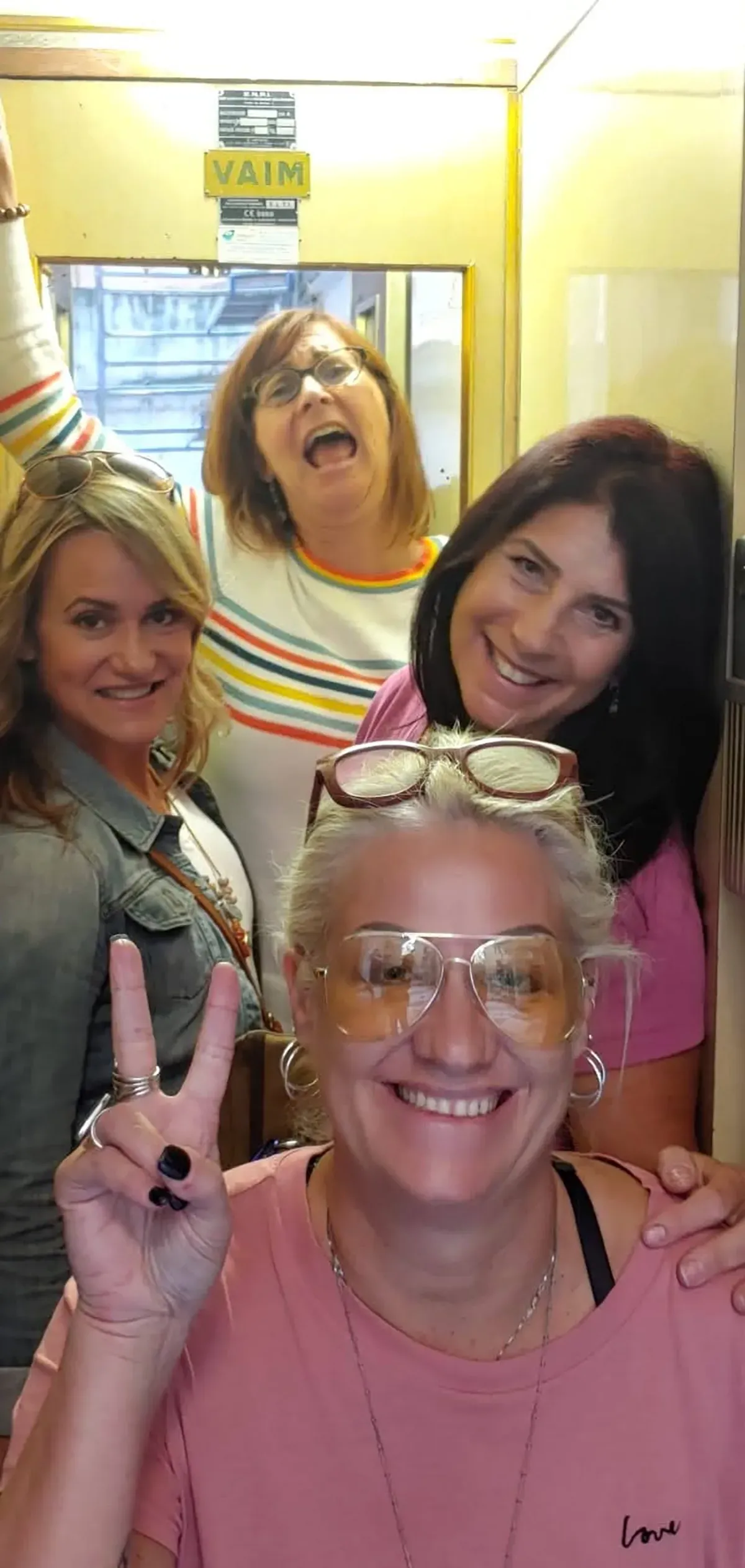4 girlfriends in tight quarters on a train to Italy