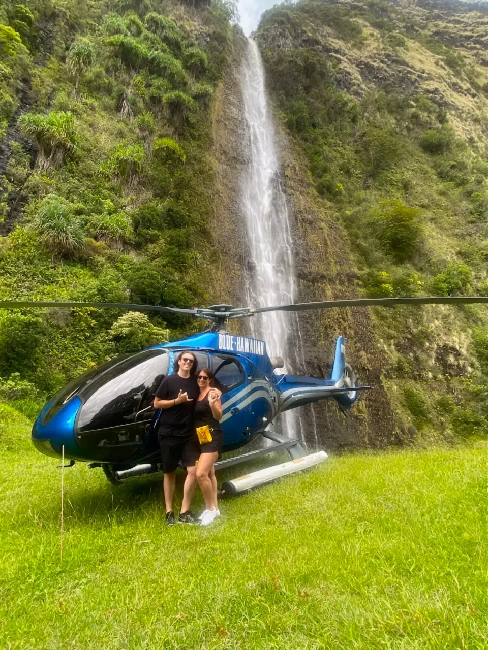 Paula and her son ready to take a helicopter ride