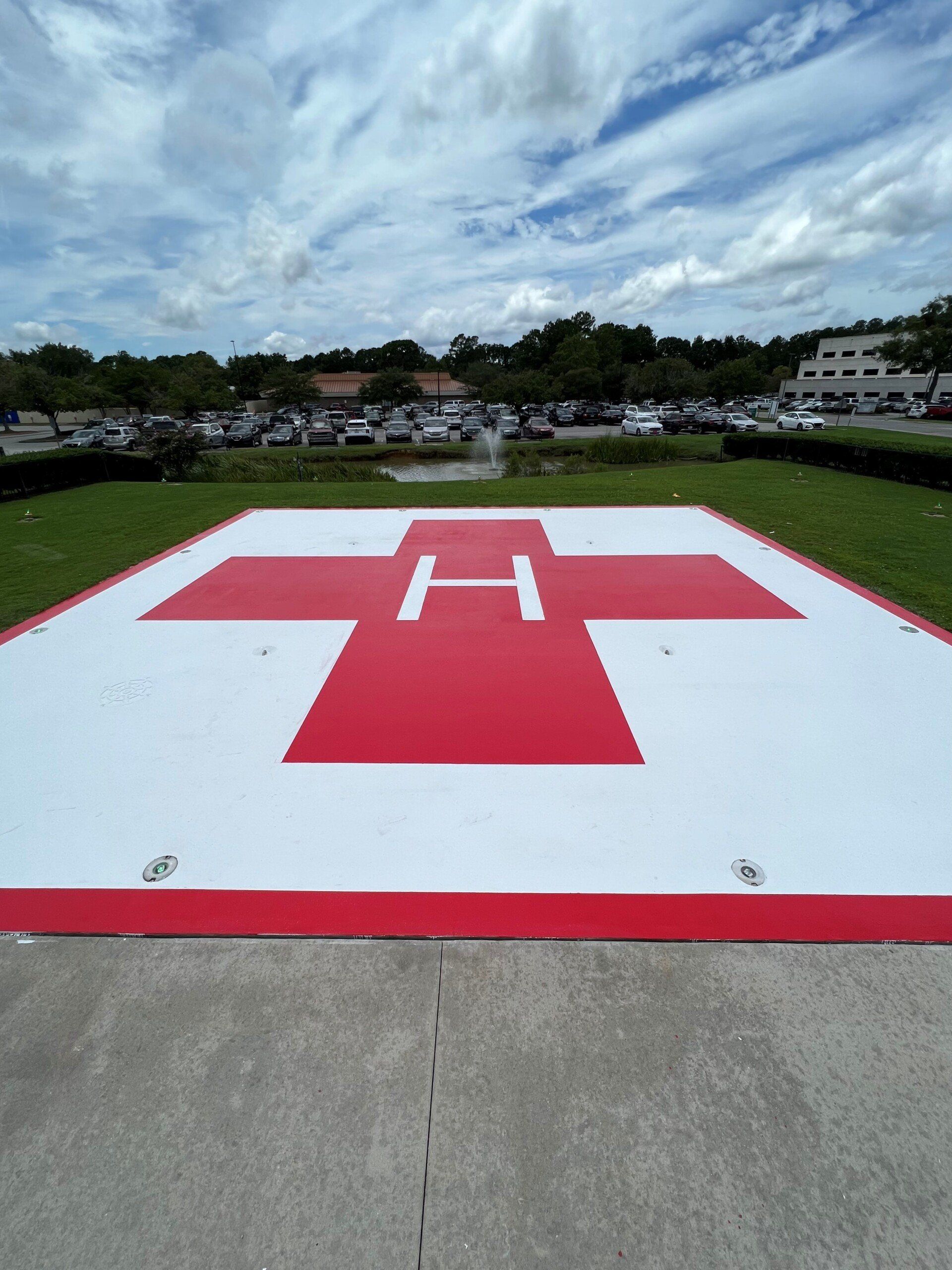 Helipad marked with a red cross and 