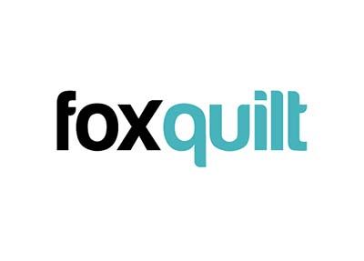 Foxquill logo in black and teal text on a white background
