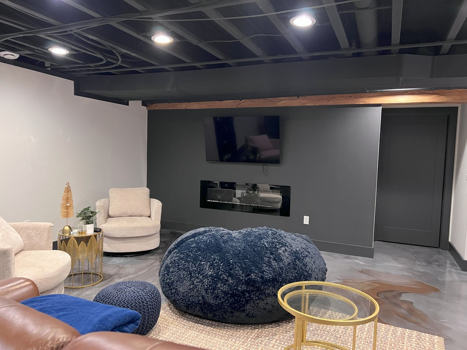 A living room with a couch , coffee table , and rug.