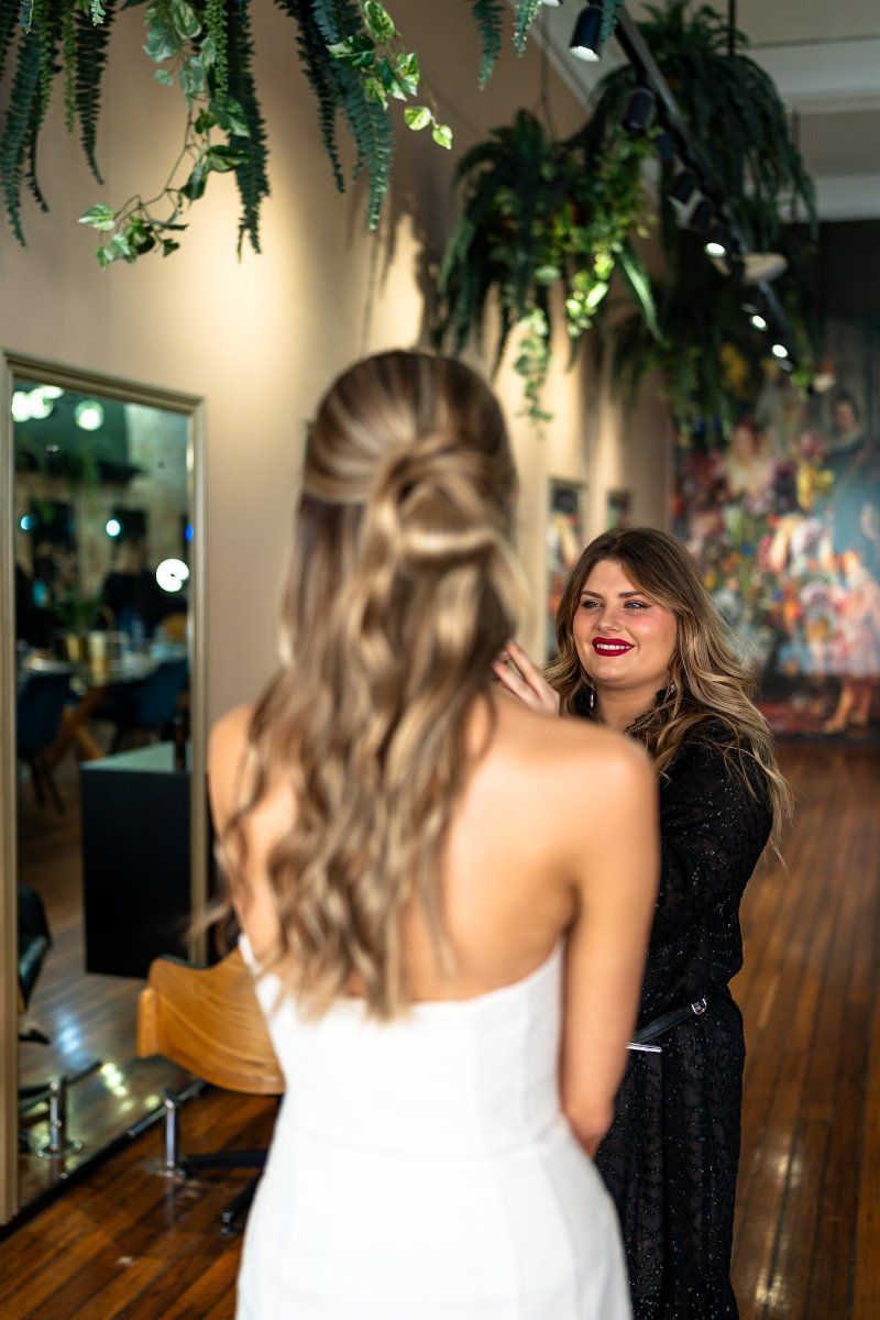 A Woman is Getting Her Hair Blow Dried in a Salon  — Air Hair Studio in Toowoomba City, QLD
