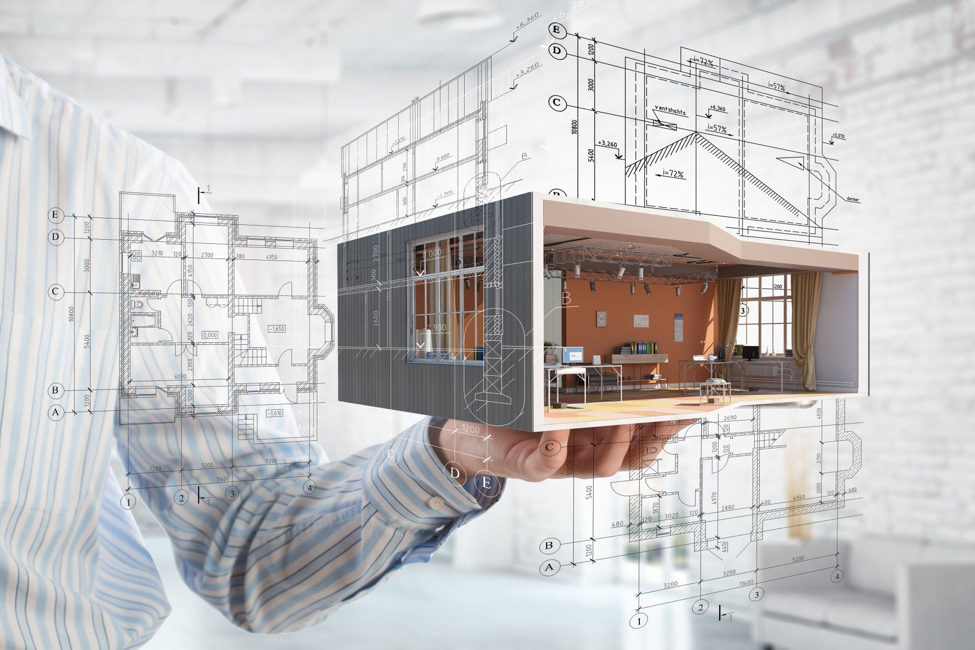 Person holding a small architectural model with blueprints and wireframe sketches in the background