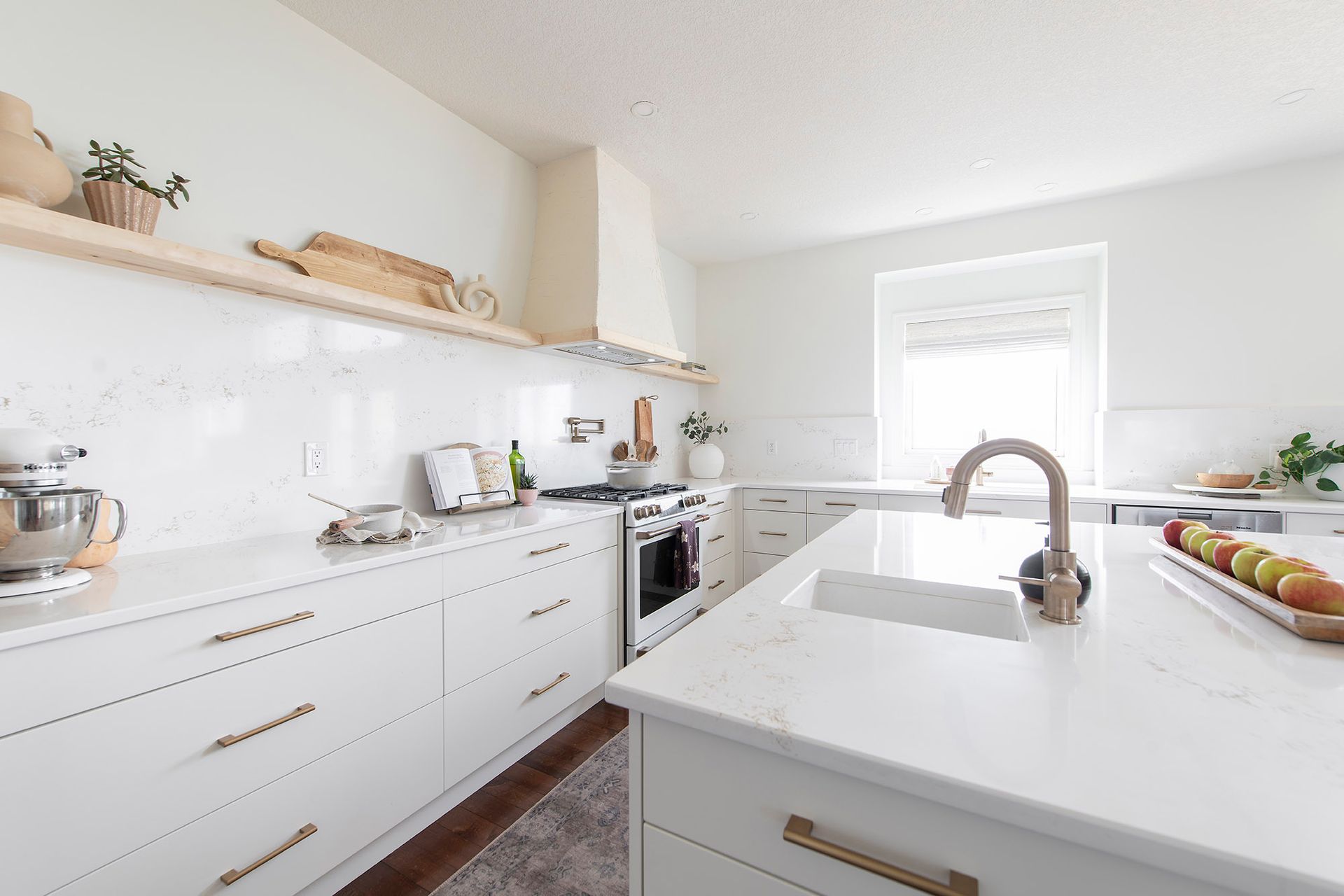 white kitchen interior with hanging lights