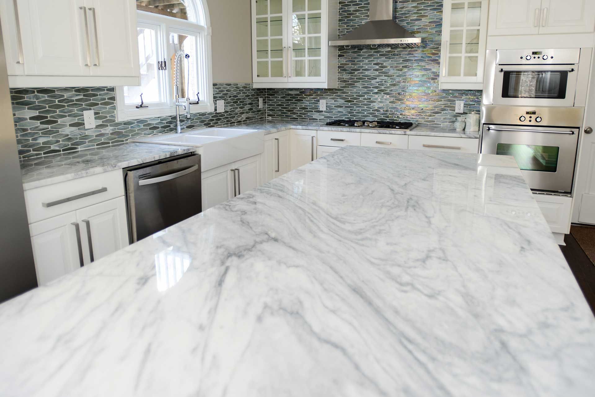 white kitchen interior with hanging lights