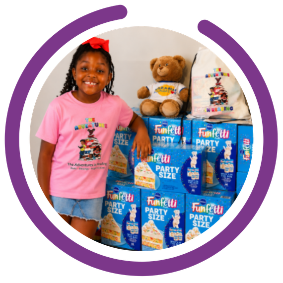 Young girl leaning up against boxes of Funfetti cake mix with teddy bears and actual birthday cake. Purple semicircle graphic around image