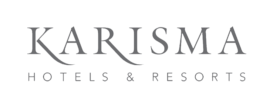 Logotipo de Karisma Hotels & Resorts en texto gris sobre fondo blanco