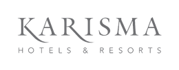 Logotipo de Karisma Hotels & Resorts en texto gris sobre un fondo blanco