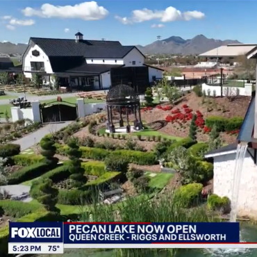 Pecan Lake garden with gazebo, landscaped paths, homes, mountains, and FOX Local news banner