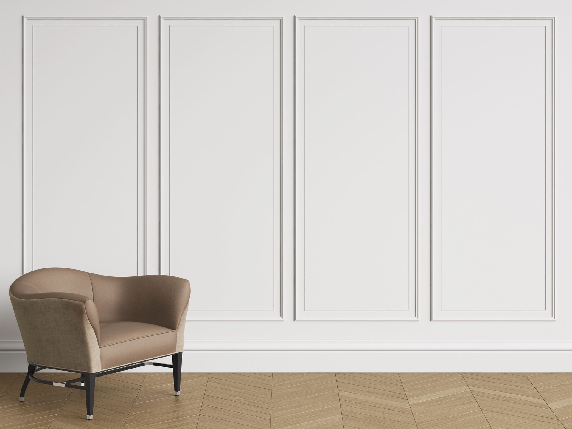 Tan armchair in front of a white paneled wall and beige tiled floor