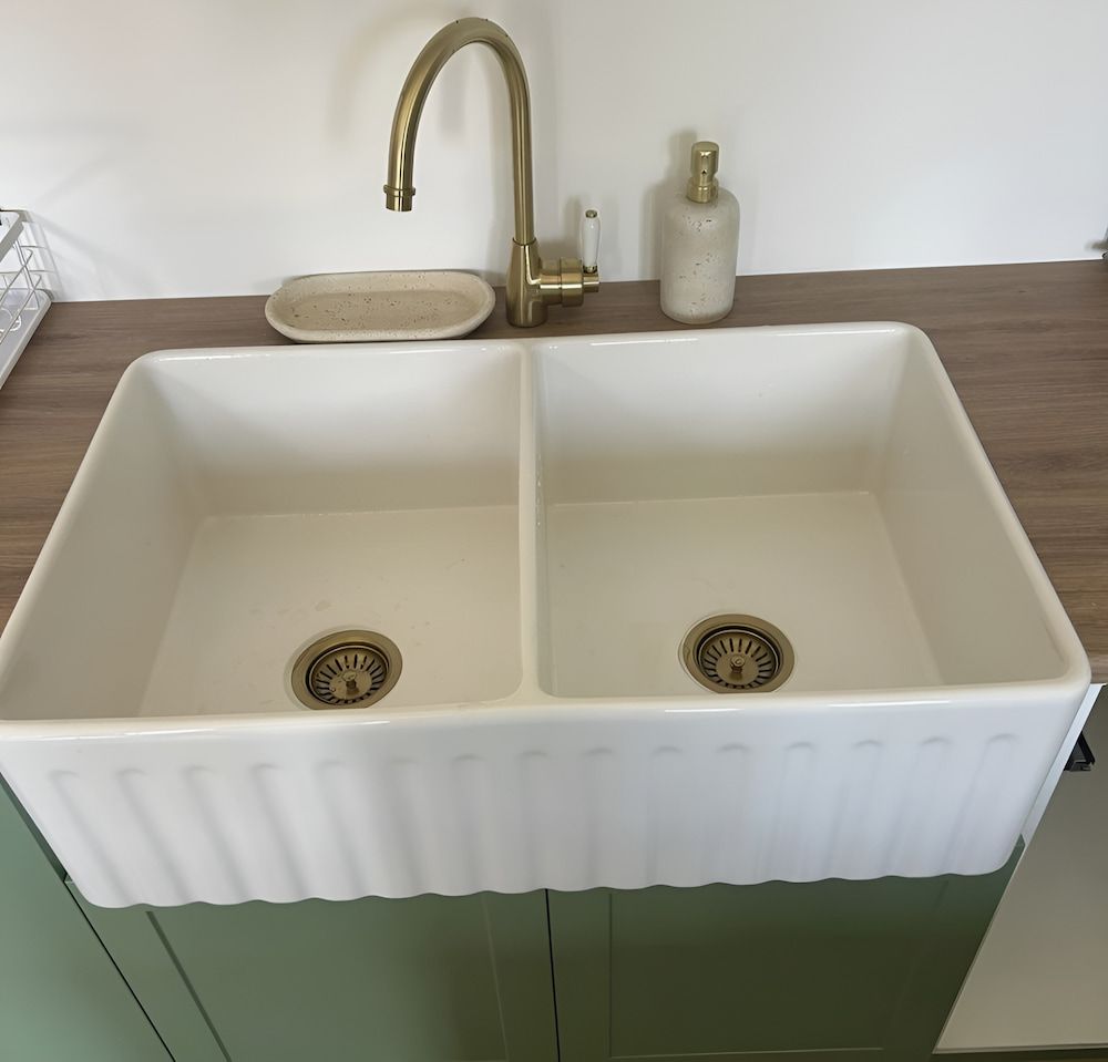A White Kitchen Sink With Two Drains And A Faucet — DMK Plumbing in Crescent Head, NSW