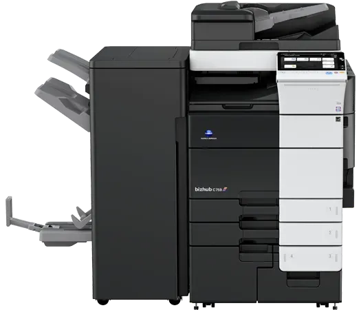 A black and white printer is sitting on top of a white table.