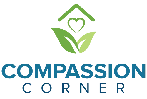 Compassion Corner logo with green house, heart, and leaves above blue text on white background