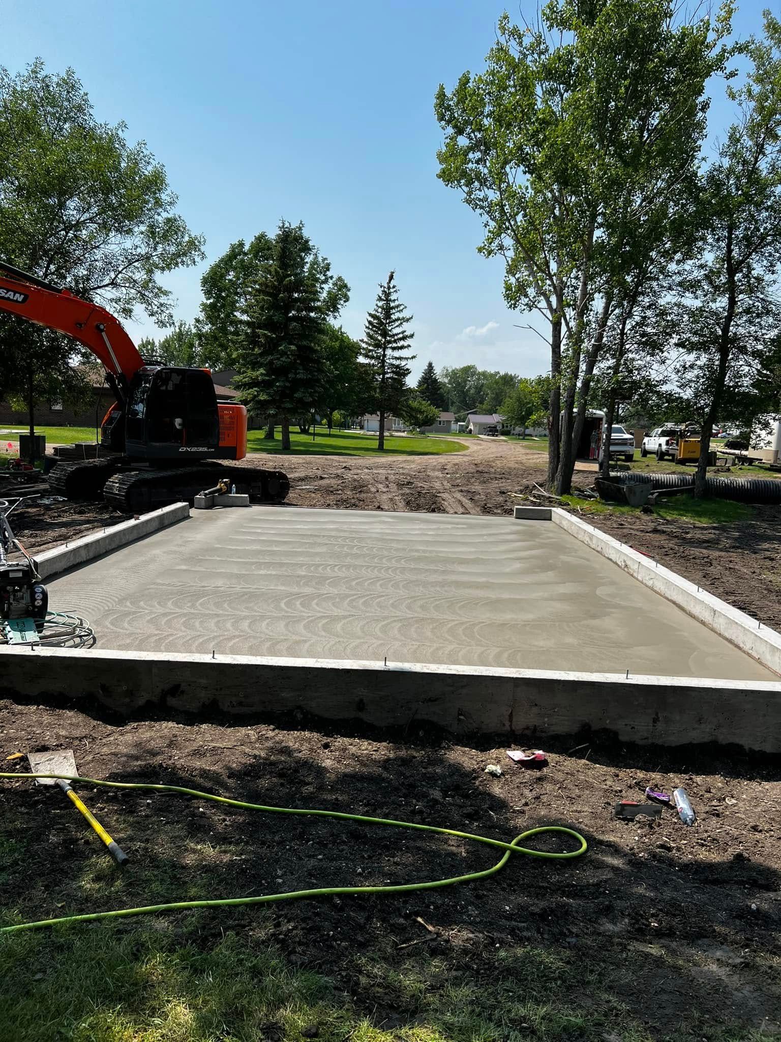Cement Patio Rounded Custom Concrete Patios | Barlow Builders | Minot & Burlington, ND