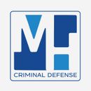 Blue "MH" logo in a white square, "CRIMINAL DEFENSE" below.