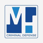 Blue "MH" logo in a white square, "CRIMINAL DEFENSE" below.