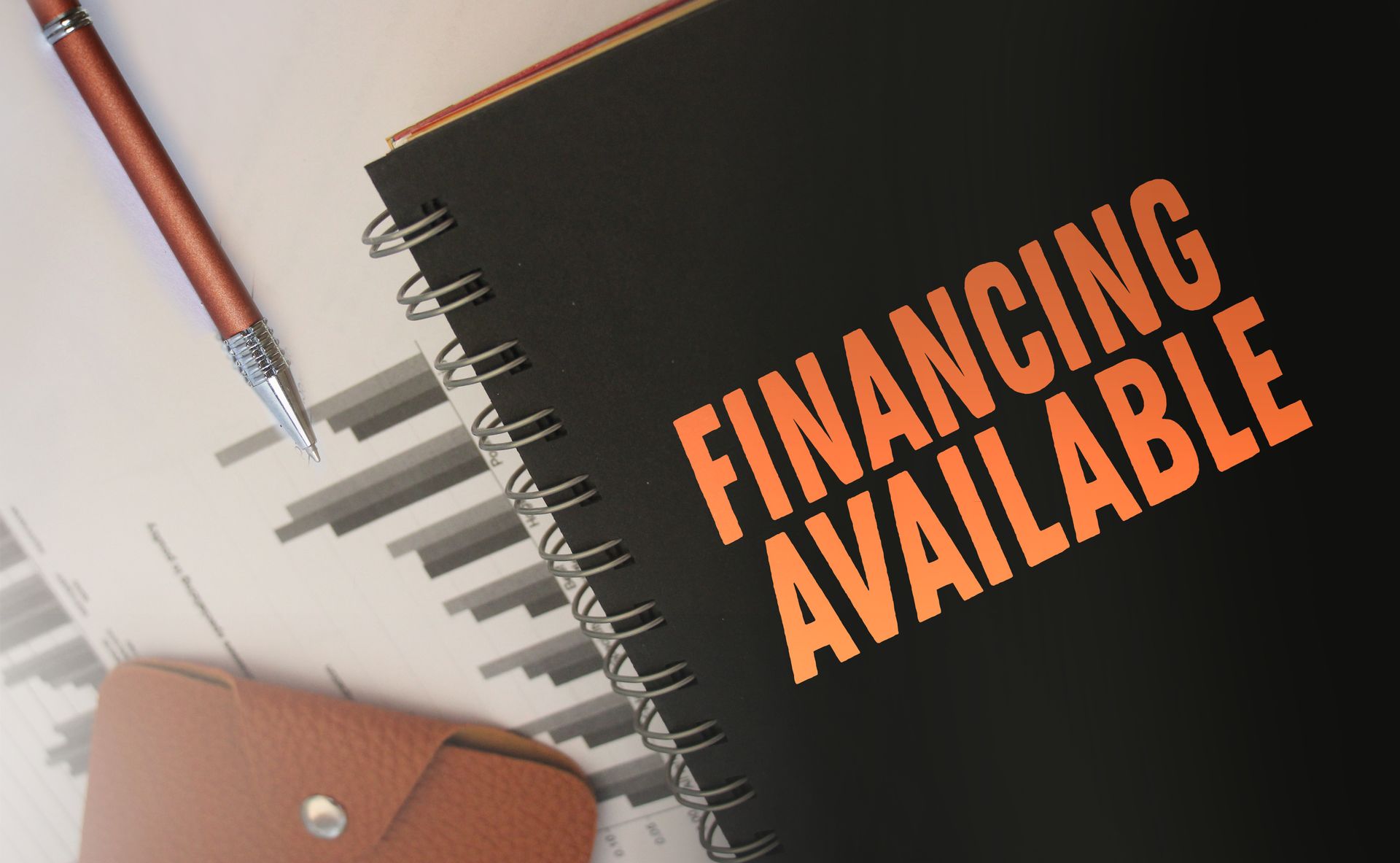 Anything Roofing and Construction contractor reviewing a financing estimate with a homeowner at their front door in Granger, Iowa