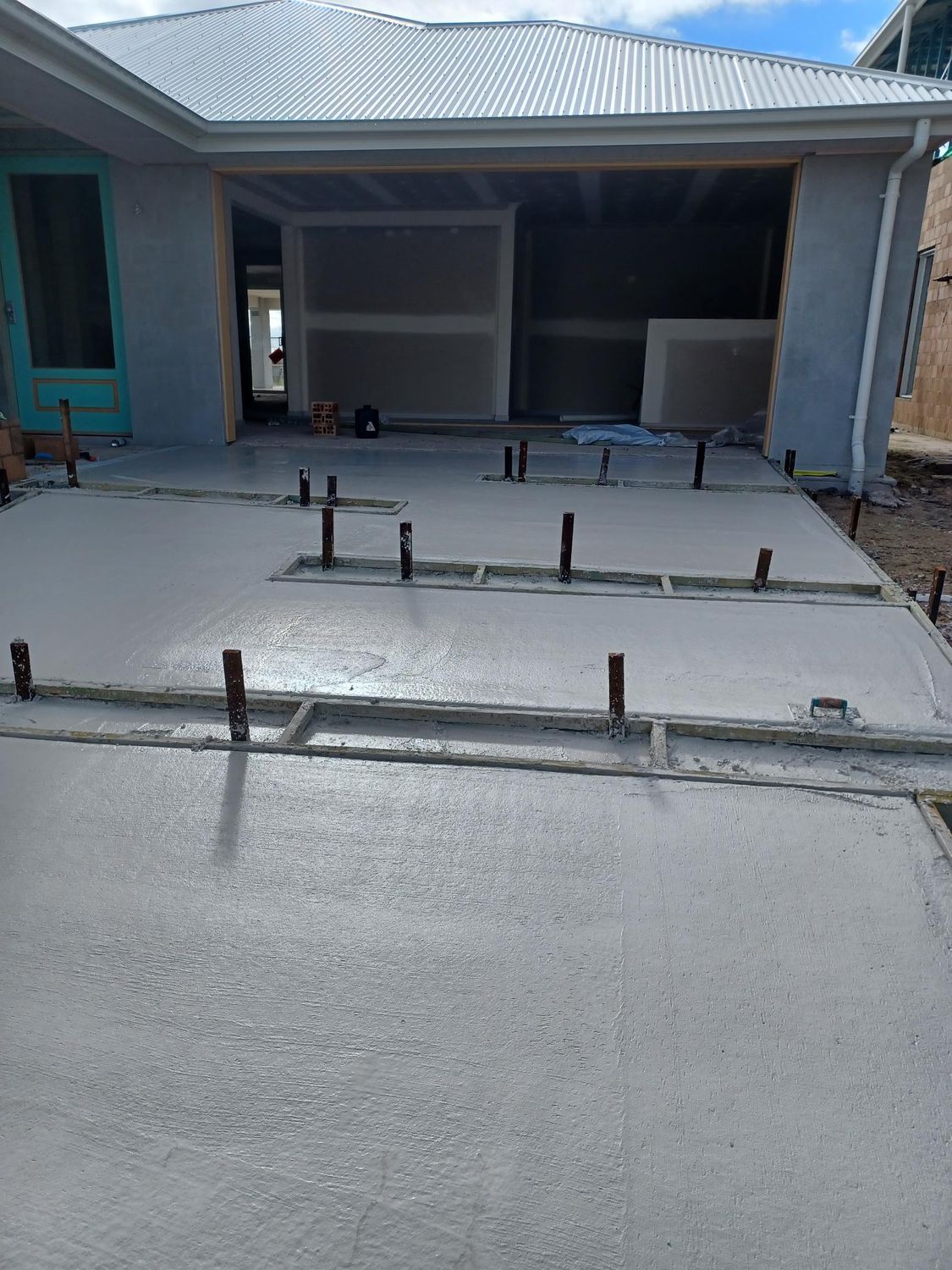 Freshly Poured Concrete Patio With Metal Supports — DPC Decorative Patterned Concrete in Sunrise Beach, QLD