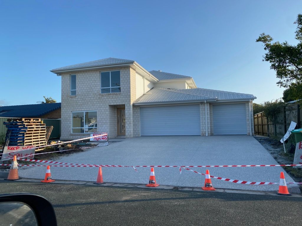 New Two-story House With a Double Garage — DPC Decorative Patterned Concrete in Caloundra, QLD