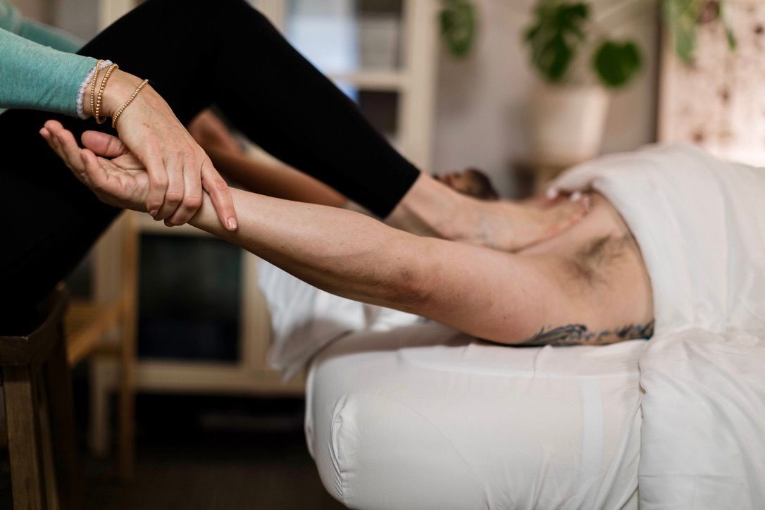 A variation of deep tissue massage by a massage therapist practitioner.