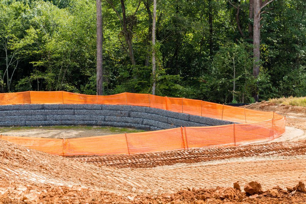 Curved Wall, Stacked Stone Blocks at a Construction Site — Environment Restoration Solutions in Lismore, NSW