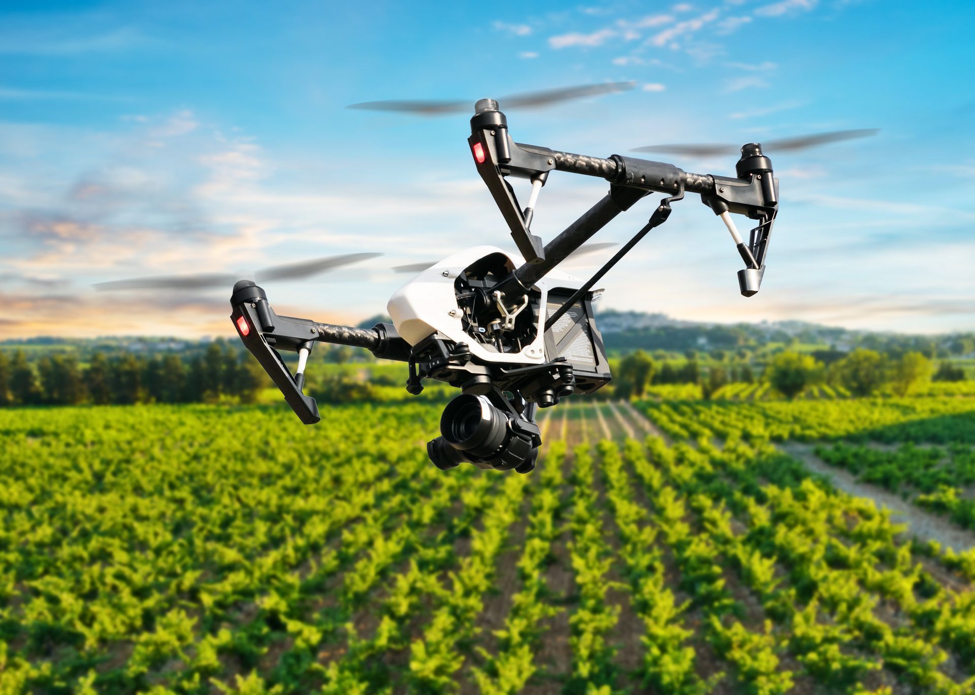 Drone Spraying Crops Over a Green Farm Field at Sunset — Environment Restoration Solutions in Waterview Heights, NSW