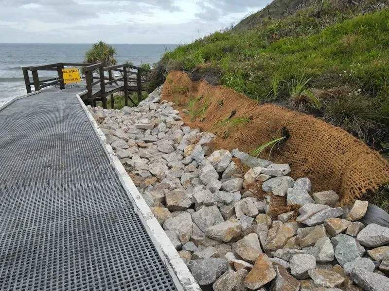 A Rock-Filled Embankment and Erosion Control Matting — Environment Restoration Solutions in Waterview Heights, NSW
