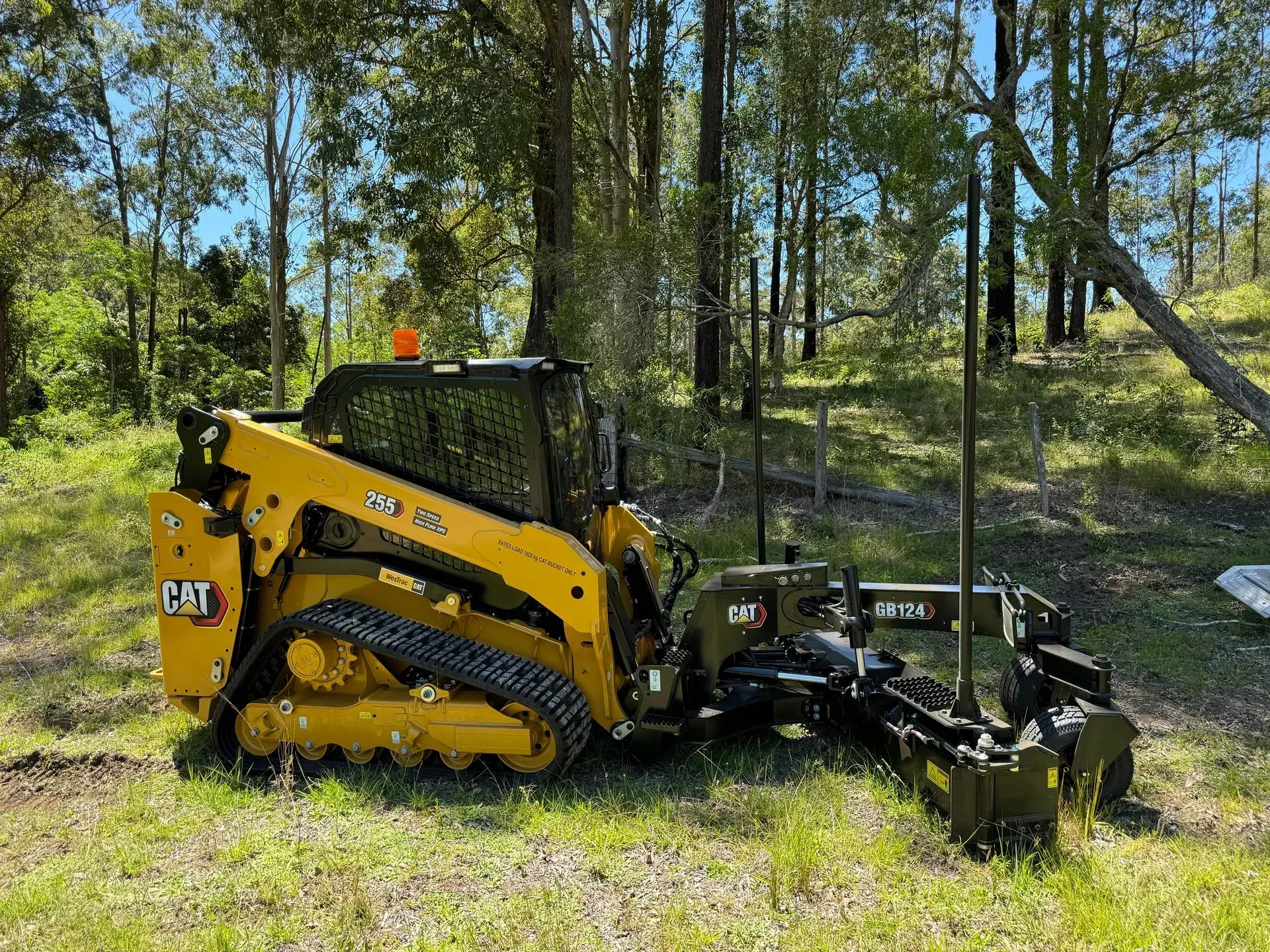 A Yellow Caterpillar Compact Track Loader — Environment Restoration Solutions in Waterview Heights, NSW