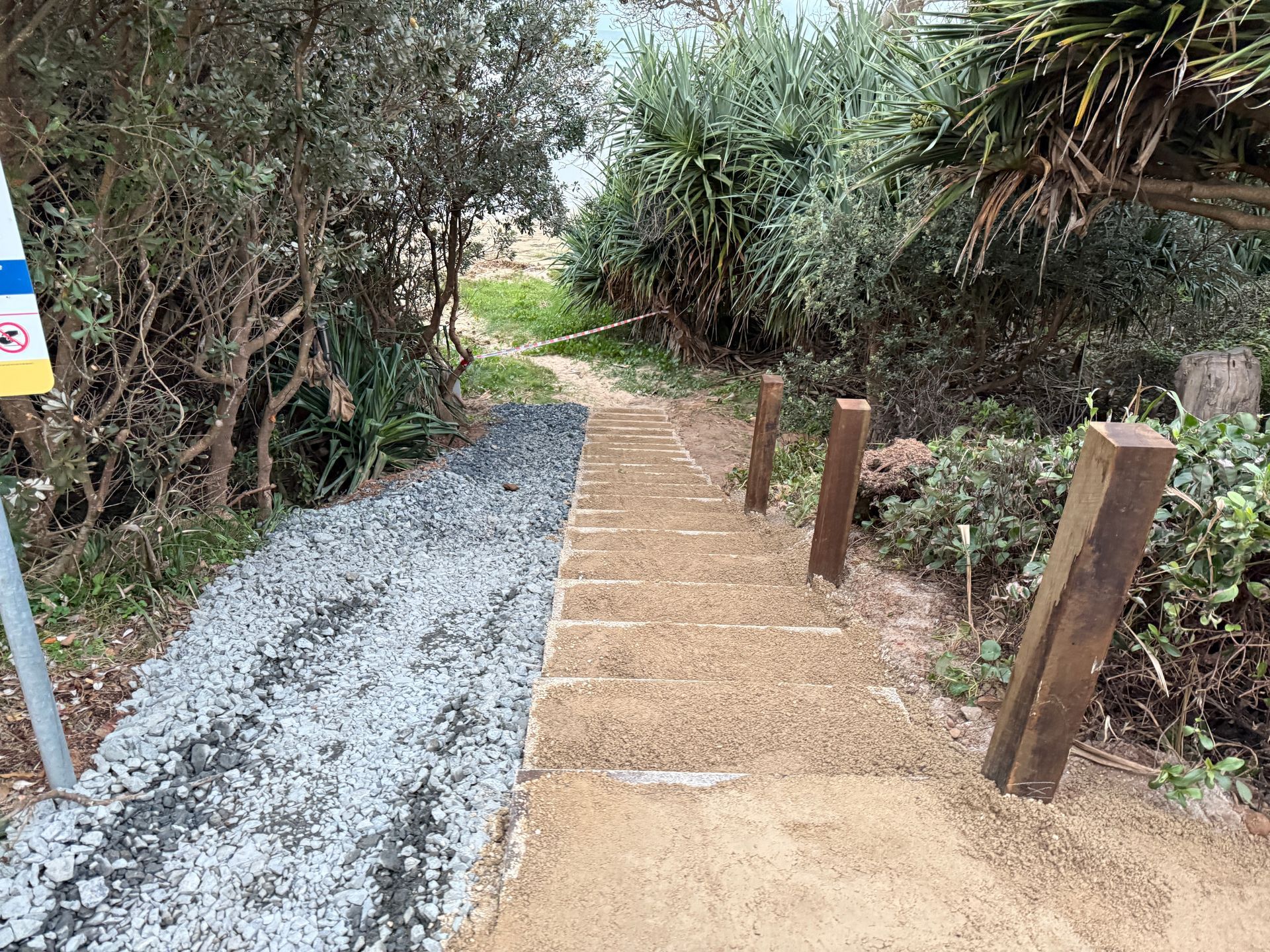 Narrow Gravel and Brick Garden Path Bordered — Environment Restoration Solutions in Waterview Heights, NSW