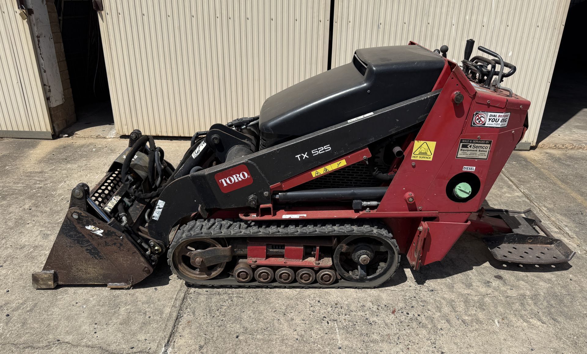 Yellow Mini Excavator with A Black Cab on Metal Tracks — Environment Restoration Solutions in Waterview Heights, NSW