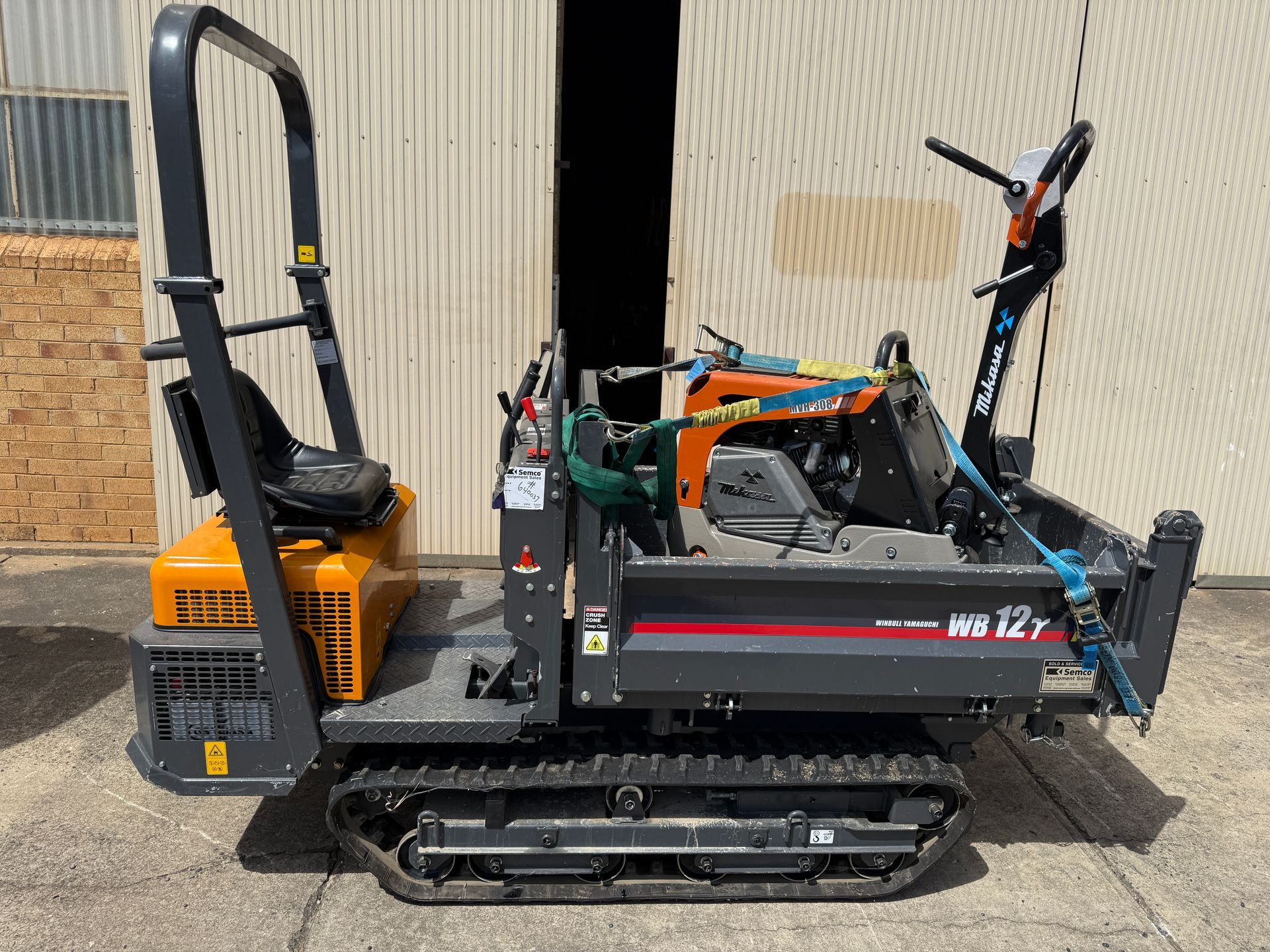 Yellow Mini Excavator with A Black Cab on Metal Tracks — Environment Restoration Solutions in Waterview Heights, NSW