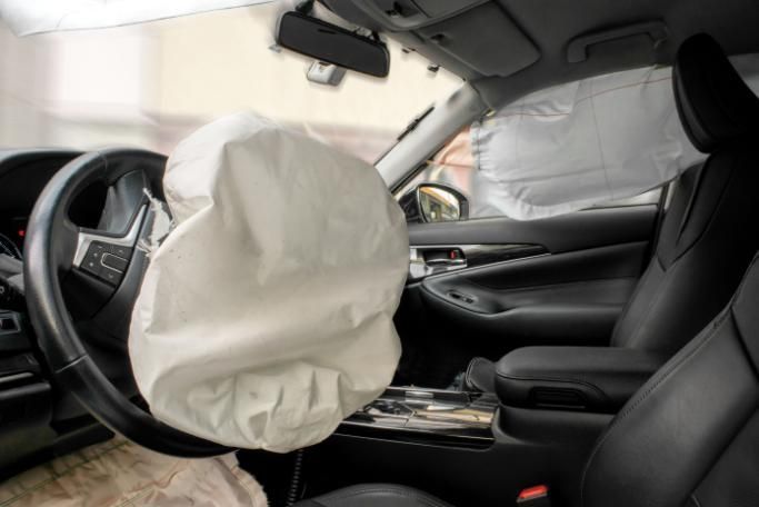 A Car with An Airbag on The Steering Wheel — Belmont Auto Electrics and Air Conditioning in Belmont, NSW