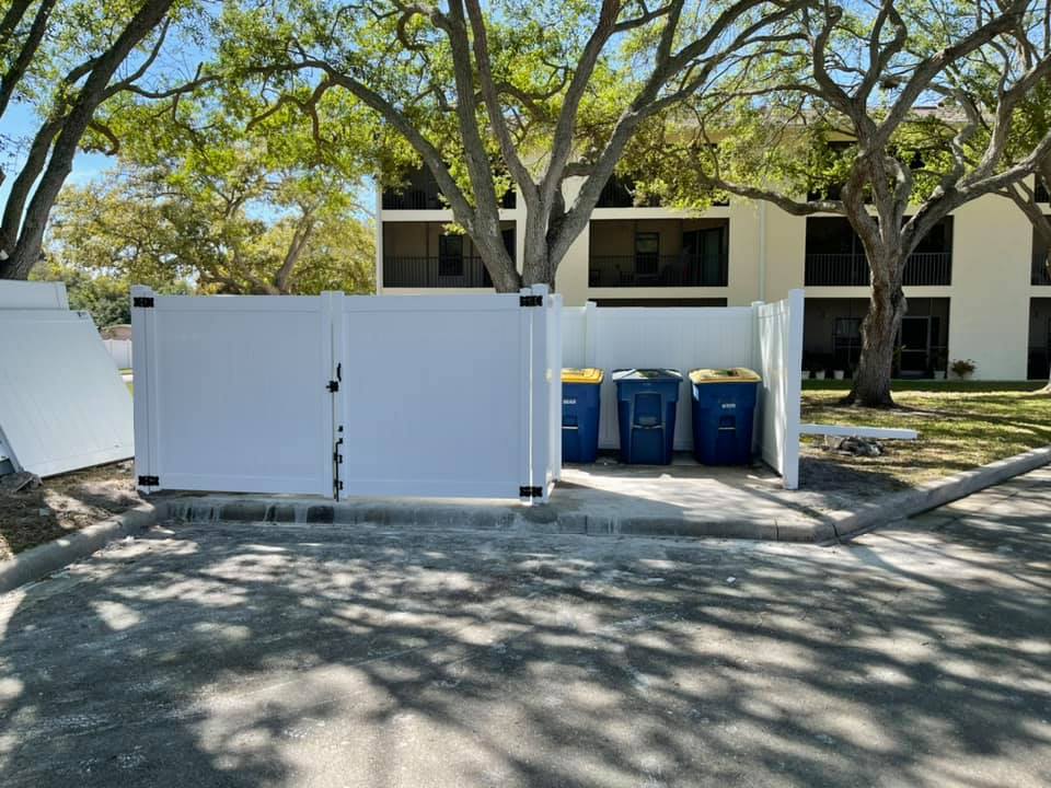White Vinyl Trash Corral fence