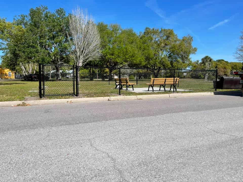 Black Vinyl Coated Chainlink fence at Dog park enclosure