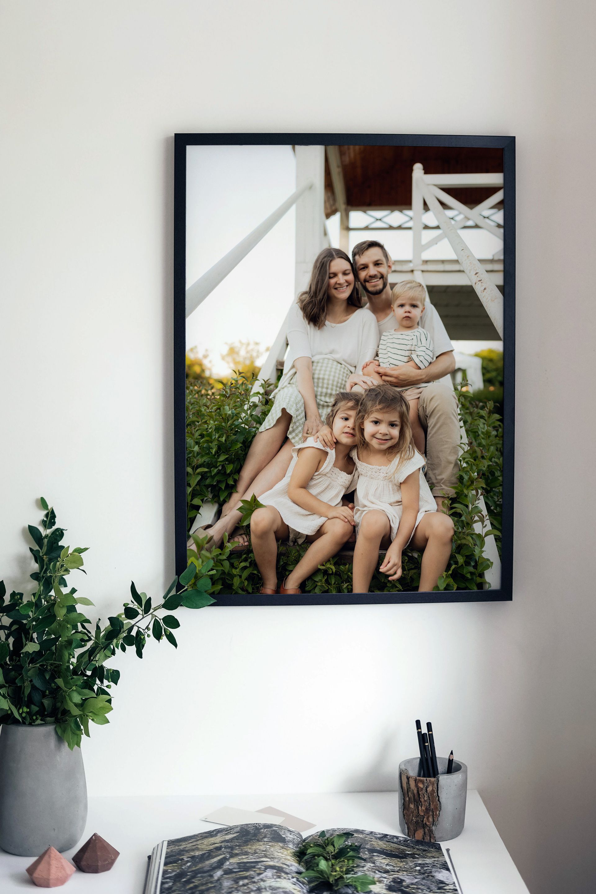Set of two photo prints on cupboard top