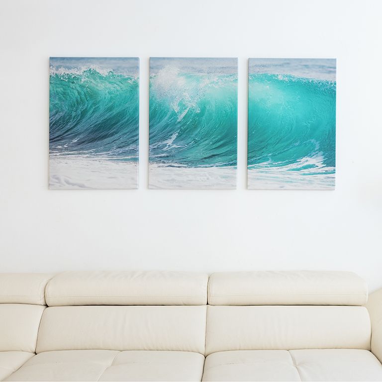 Three canvas film prints on a wall
