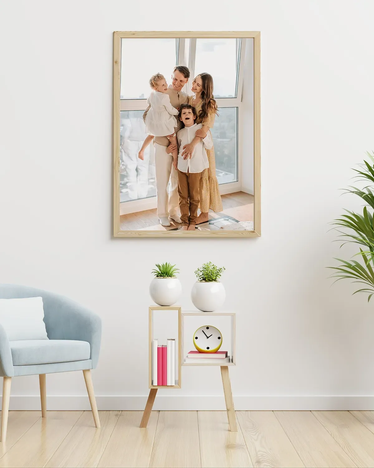 Large photo print of family portrait framed on a wall