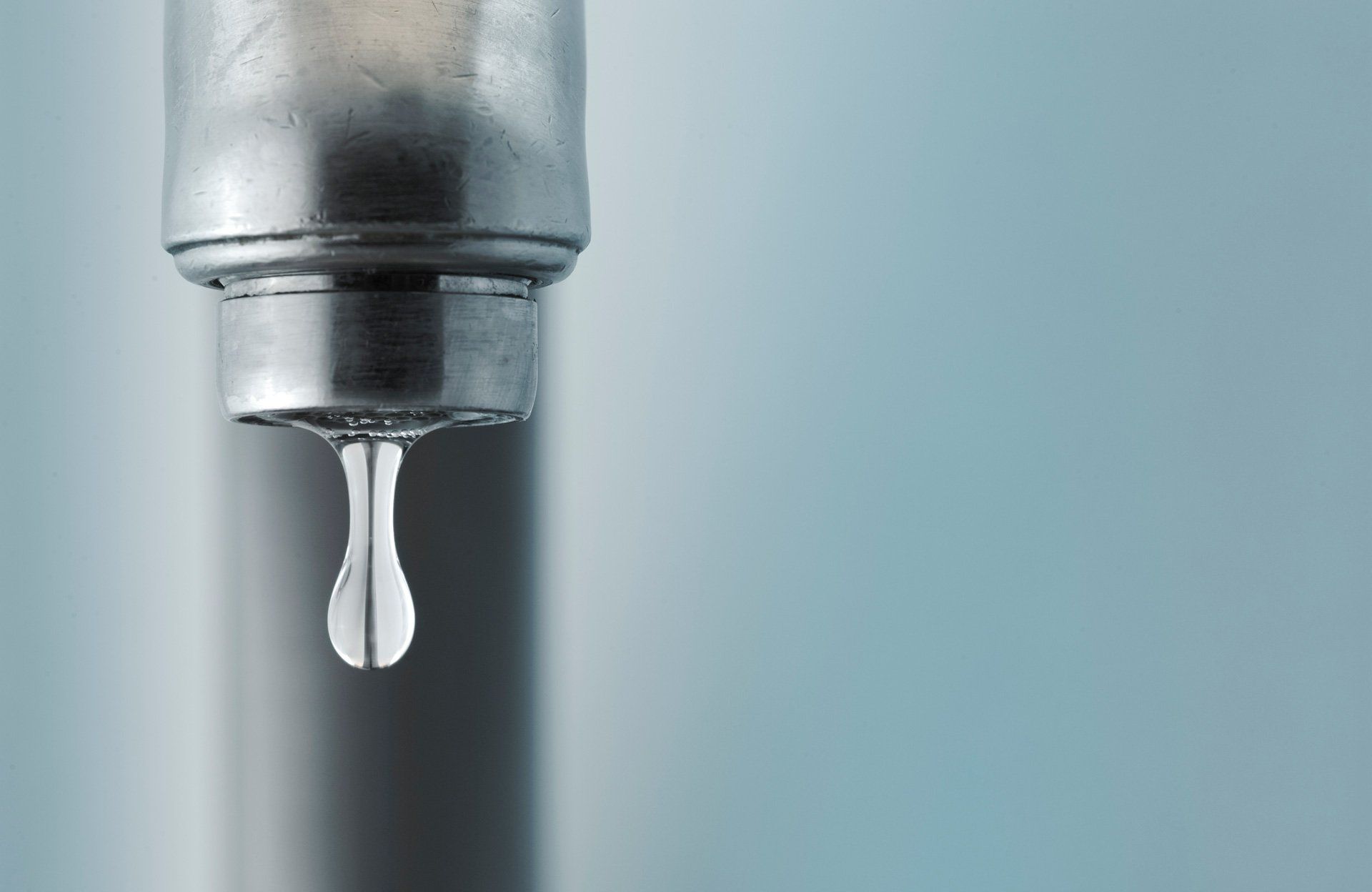 tap with water droblet falling