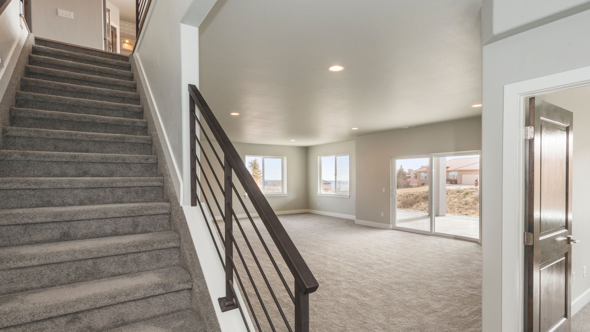There are stairs leading up to the second floor of a house.