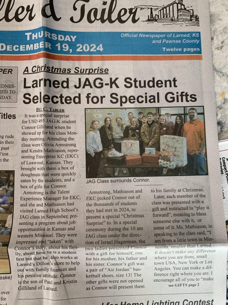 Newspaper front page with headline “Larned JAG-K Student Selected for Special Gifts” and a gift display photo