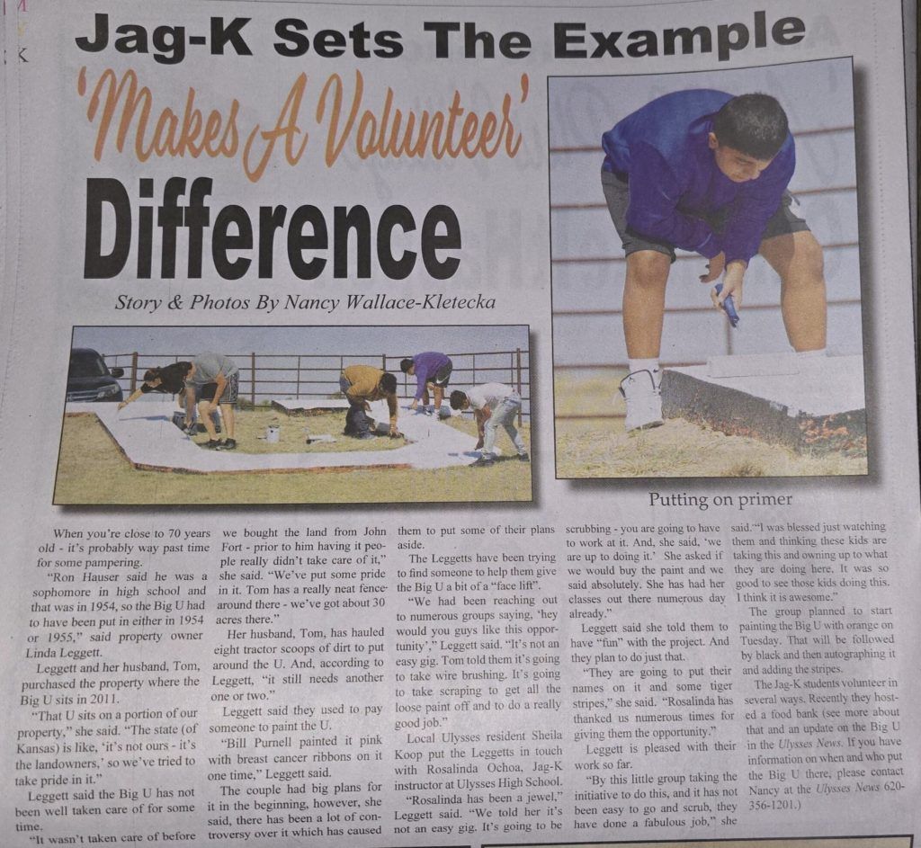 Newspaper clipping about volunteerism with headline “Jag-K Sets The Example” and photos of people working outdoors