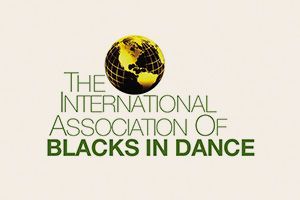 Logo reading “The International Association of Blacks in Dance” with a yellow and black globe icon.