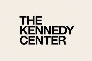 The Kennedy Center logo in bold black text on a light beige background